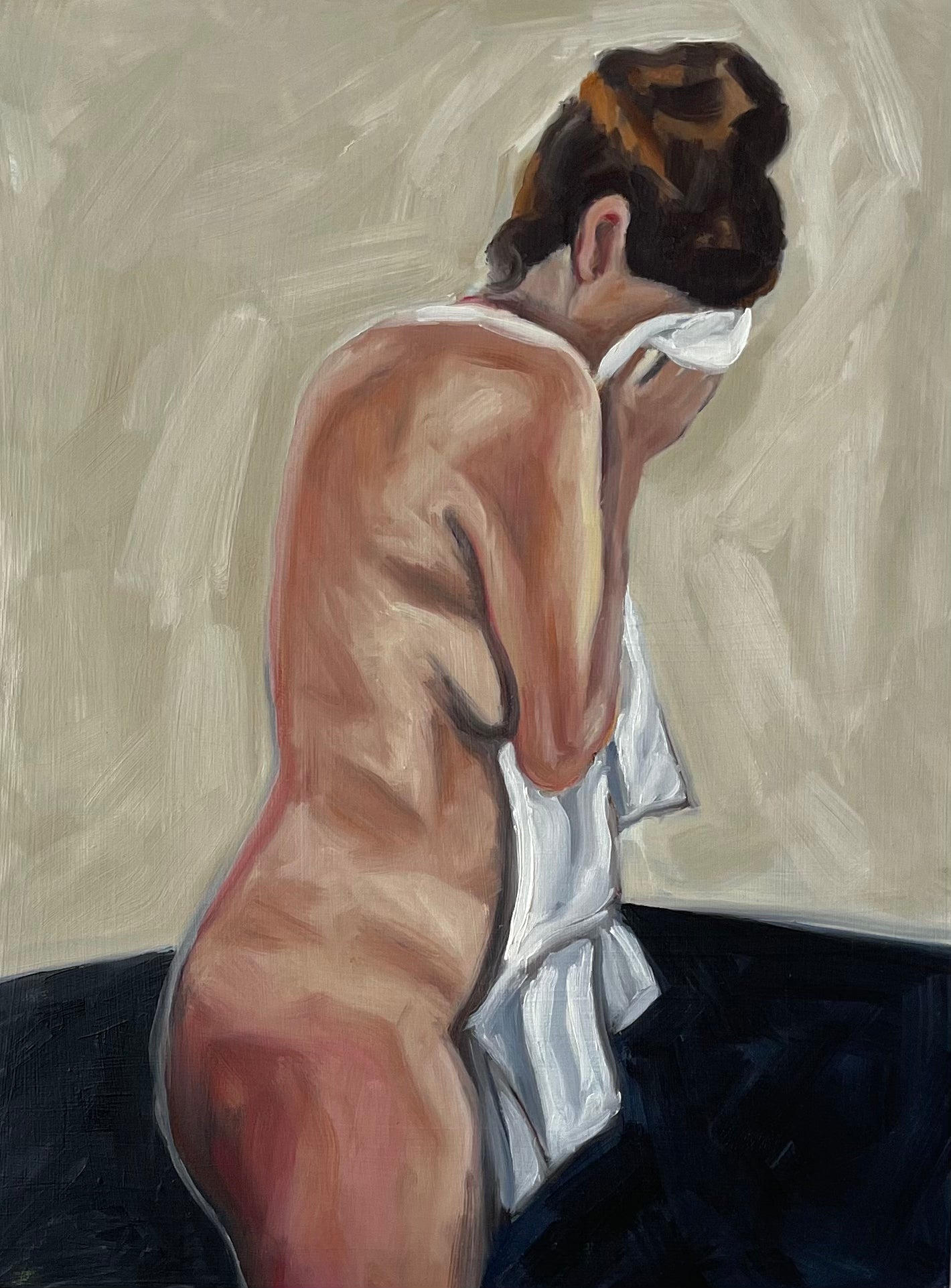 Woman with head in towel