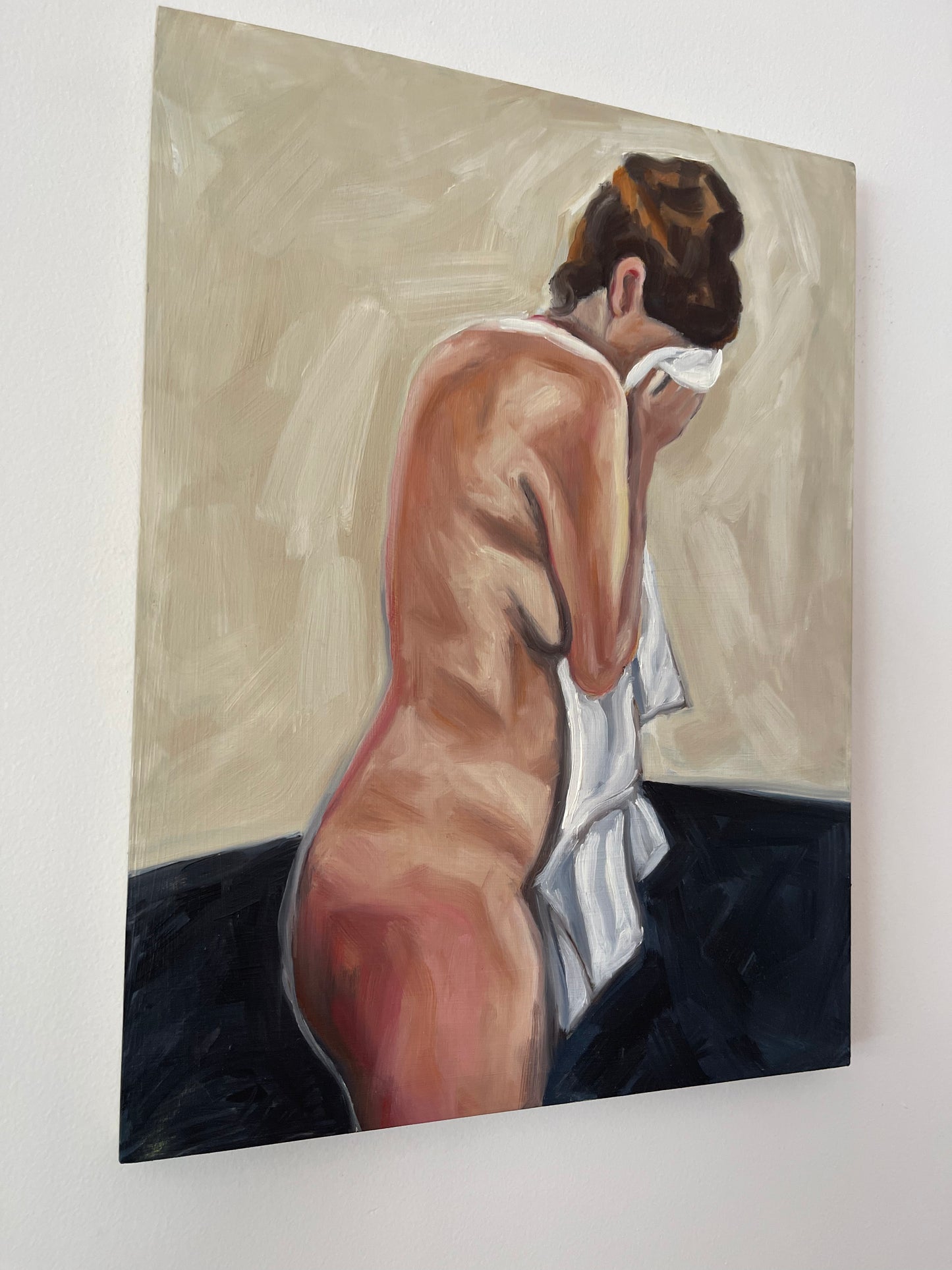 Woman with head in towel