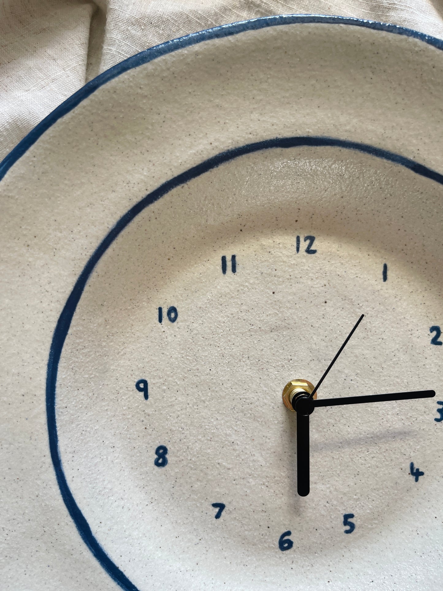 Ceramic clock with blue trim