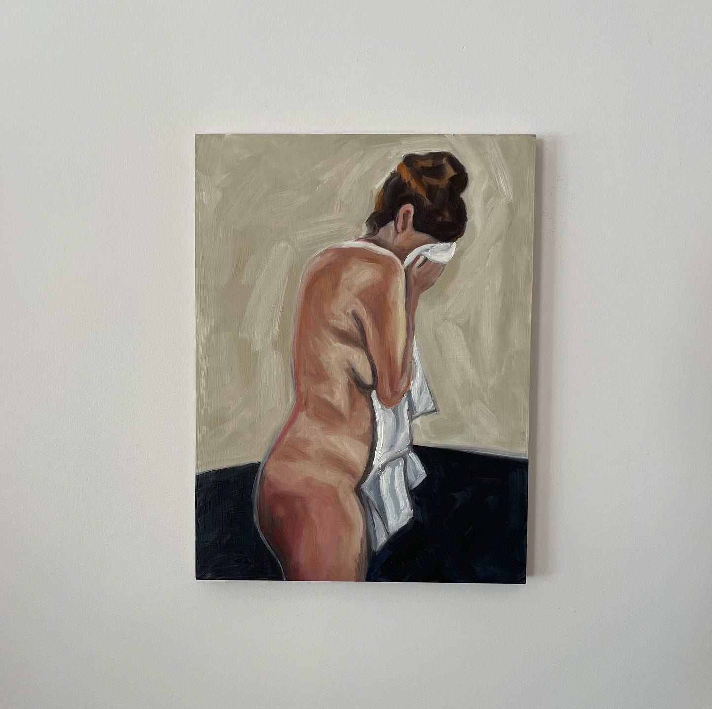 Woman with head in towel