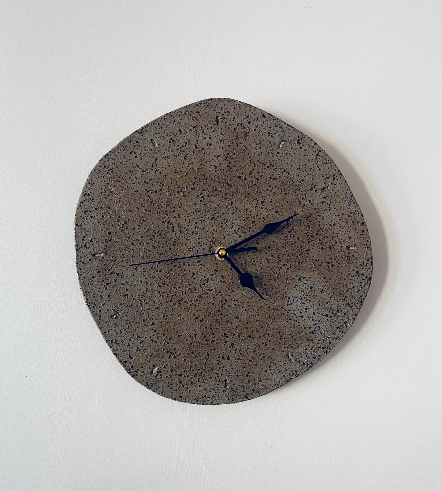 Handmade ceramic clock in speckled brown