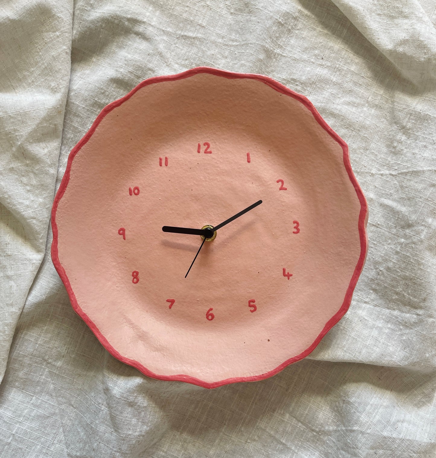 Pink ceramic clock