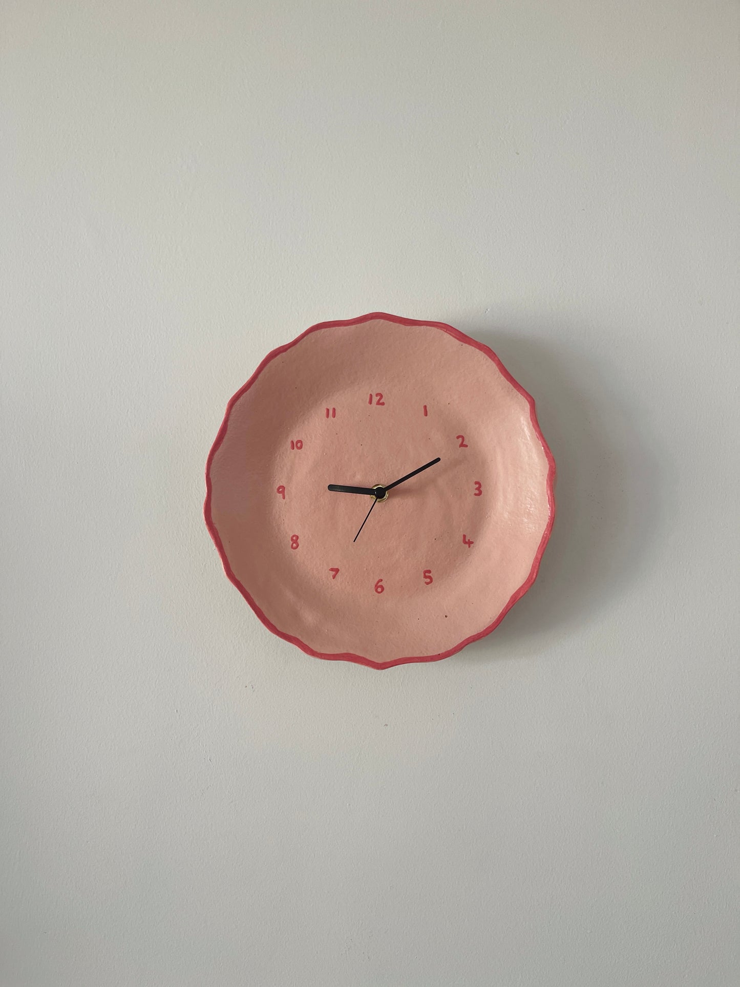 Pink ceramic clock