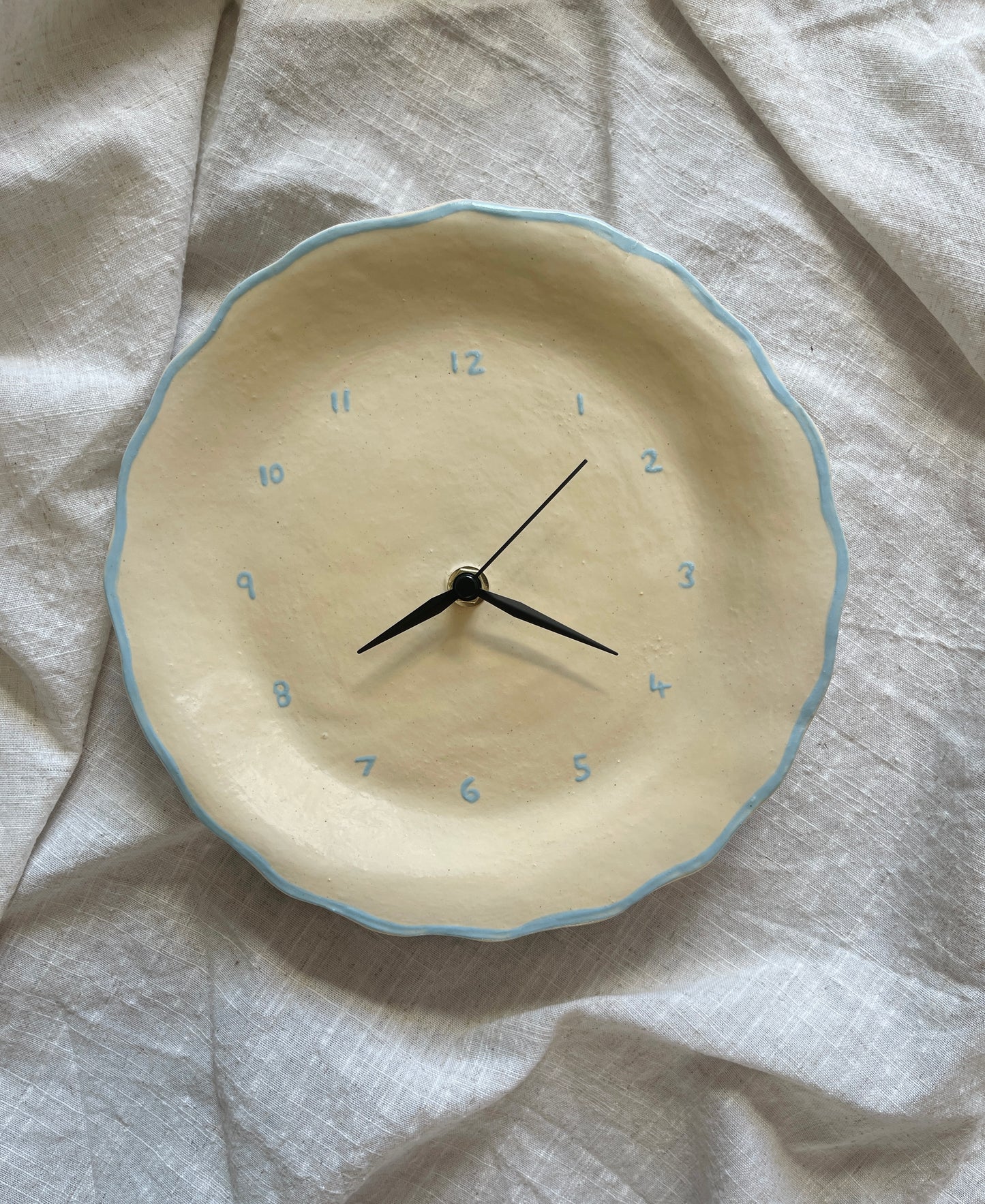 Ceramic clock light blue and cream