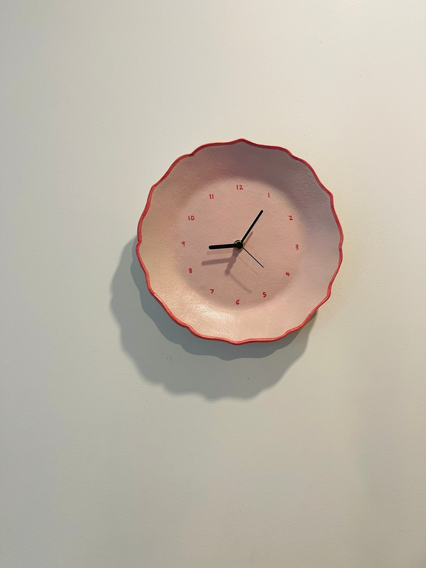 Light pink ceramic clock