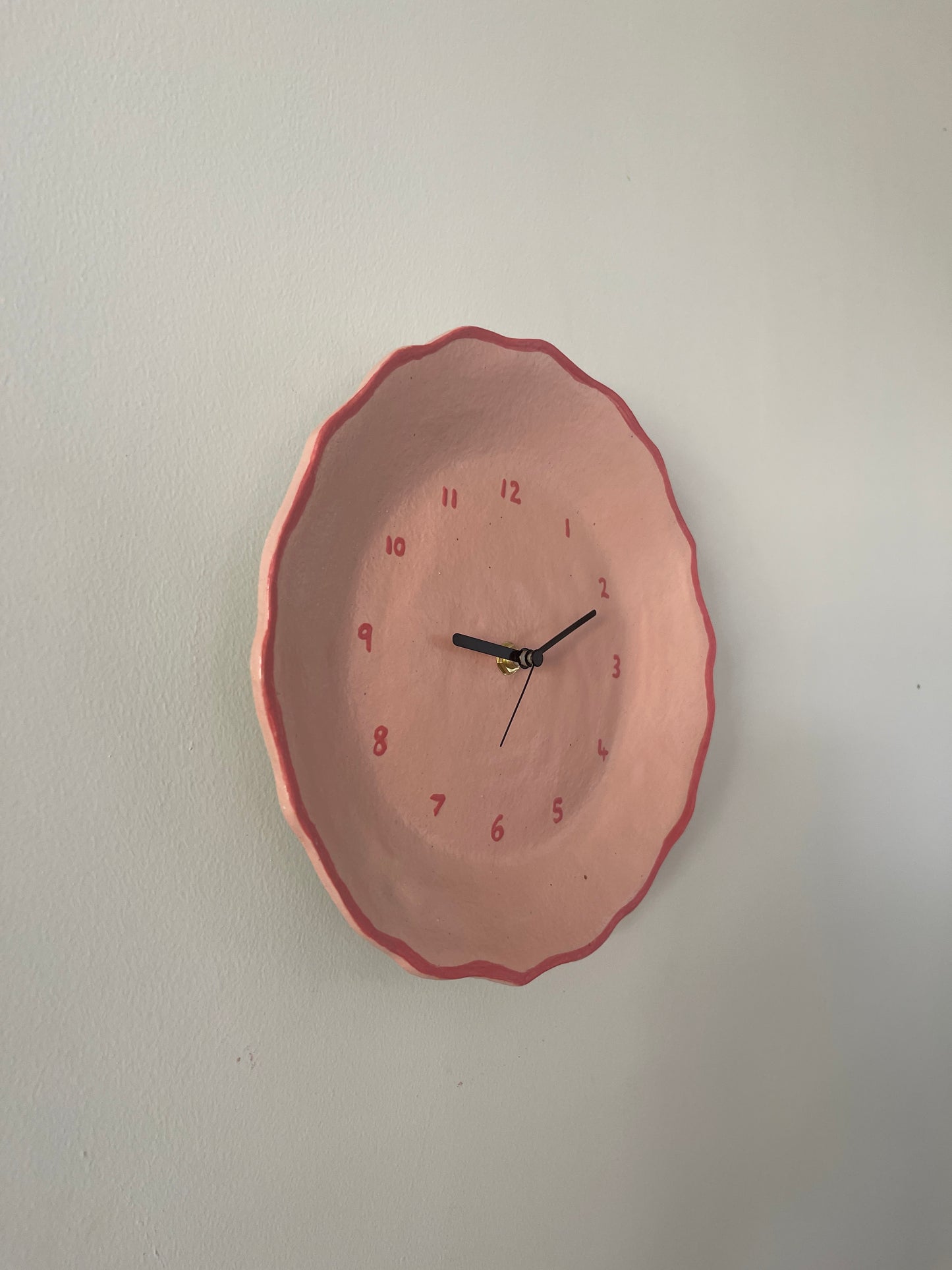 Pink ceramic clock