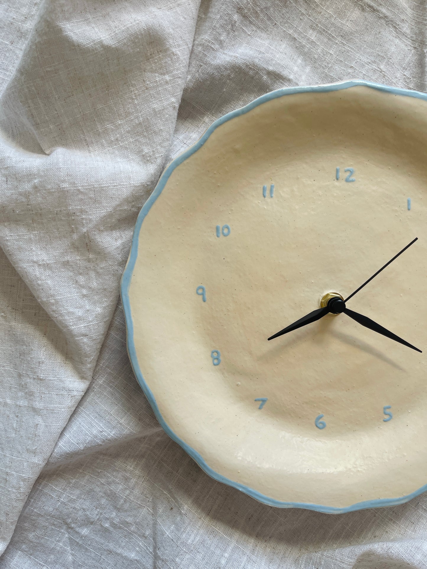 Ceramic clock light blue and cream